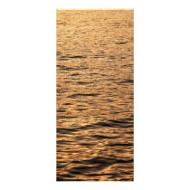 Calm sea at sunset rack cards