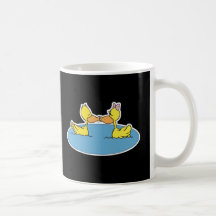canards de baiser mignons tasse