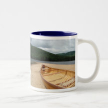 Canoe on Beach by Lake Mug