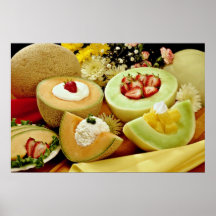 Cantaloupes and melons on cutting board with flowe posters