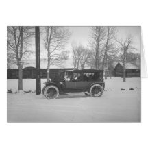 Car with a Christmas tree tied to the hood. Greeting Cards