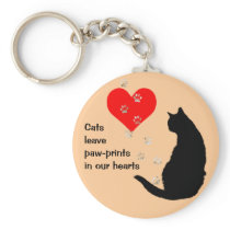 Cats leave paw-prints in our hearts keychains