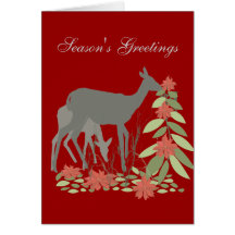 Cerfs communs avec l'arbre de poinsettia carte de vœux