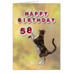 Chat espiègle et cinquante-huitième ballons de joy carte de vœux