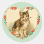 Chaton de calicot au coeur autocollants ronds