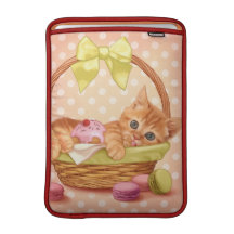 Chaton de macaron et de petit gâteau poche macbook