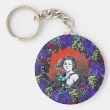 Cherub in grape wreath, red background keychains