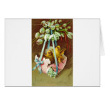 CHICKS IN EASTER EGG SWING GREETINGS CARD