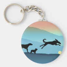 Chiens chassant la boule porte-clef