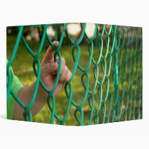 Child finger on fence binders