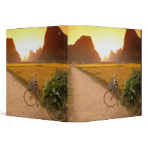 China, Guangxi. Yangzhou, Bicycle on country Vinyl Binder