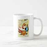 Christmas greeting with a child in a caddle and th mugs