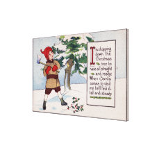 ChristmasBoy Chopping Down Christmas Tree Canvas Print