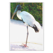 Cigogne en bois dans l'usage de soirée carte de vœux