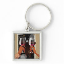 Close-up of a couple's toasting with wine glasses key chain