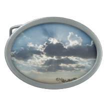 cloud and sun rays belt buckle.