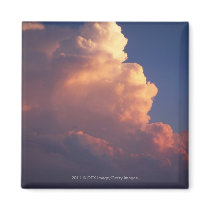 Clouds over sea at sunset fridge magnet