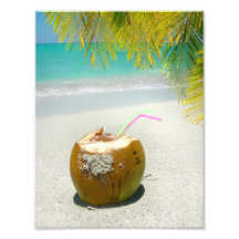 Coconut drink on tropical beach with palm leaves photographic print