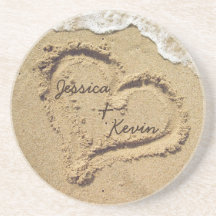 Coeur personnalisé dans les caboteurs de sable dessous de verres