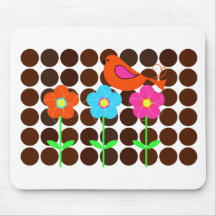 colourful bird with flowers and polka dot backgrou mousepads
