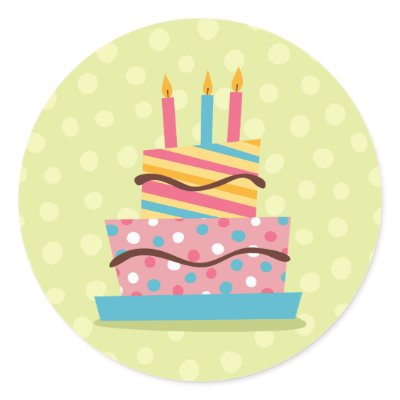 Colourful birthday cake on green background by TheStationeryShop