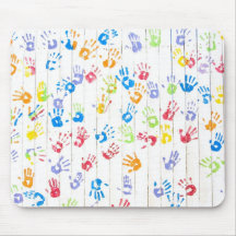 Colourful children's handprints mousepad