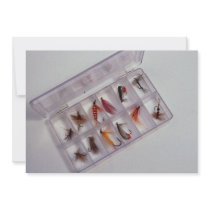 Colourful fishing hooks kept in fly box invitations