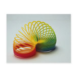 Colourful Rainbow slinky toy for kids Postcards