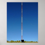 Communication tower against blue sky print