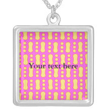 Contemporary yellow peanut pattern on pink jewelry