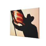 Cowboy holding Stars and Stripes, silhouette, Canvas Print