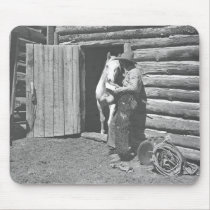 Cowboy reading a letter. mousepads