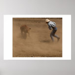 Cowboy ties a calf poster