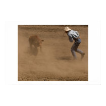 Cowboy ties a calf posters