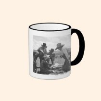 Cowboys looking a magazine mugs