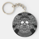 Crâne symétrique avec des armes à feu et des balle porte-clefs