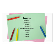Crayons on coloured papers business cards