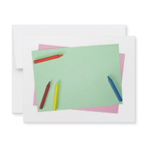Crayons on coloured papers