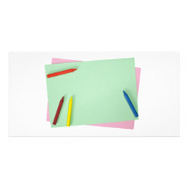 Crayons on coloured papers photo cards