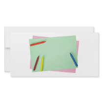 Crayons on coloured papers photo greeting card