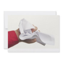 Crumpled paper in hand invite