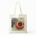 Cup of tea with chocolate canvas bags