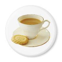 Cup of tea with cookie refrigerator magnets