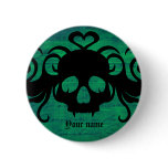 Cute fanged vampire skull dark green button