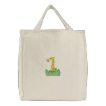 cute giraffe in bushes tote bag