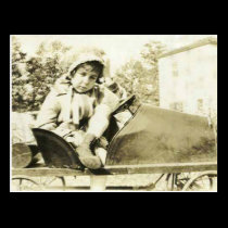 Cute girl in a peddle car postcard postcards