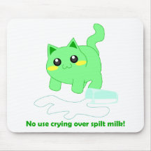 Cute kitten with spilt milk mousepads