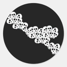 CUTE PILE OF SKULLS IN BLACK AND WHITE STICKER
