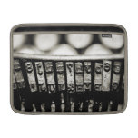 Dactylographiez la douille de Macbook Poches Macbook