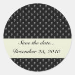 Dangerous grey skull on retro black surface stickers